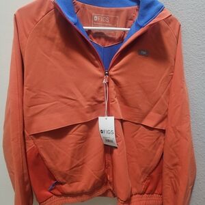 Figs Vibrant Orange Jacket with Blue Accents